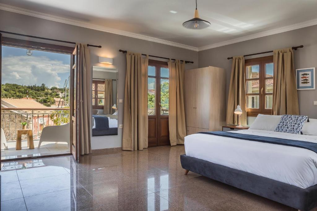 Postel nebo postele na pokoji v ubytování Balhambra Suites - Adults Only