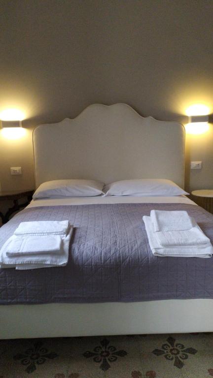 Postel nebo postele na pokoji v ubytování B&B Suite 44