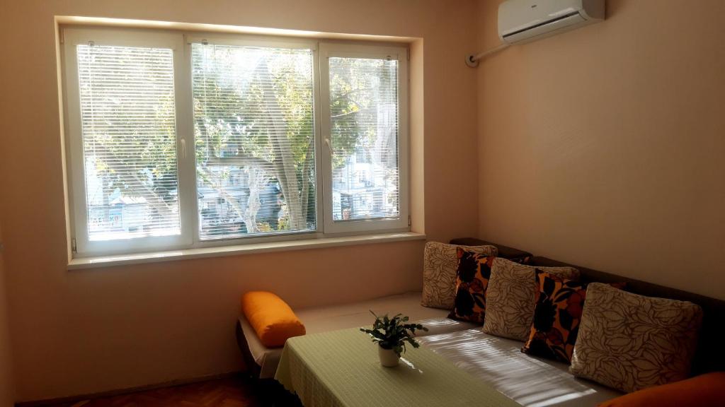 Posezení v ubytování Central Apartment