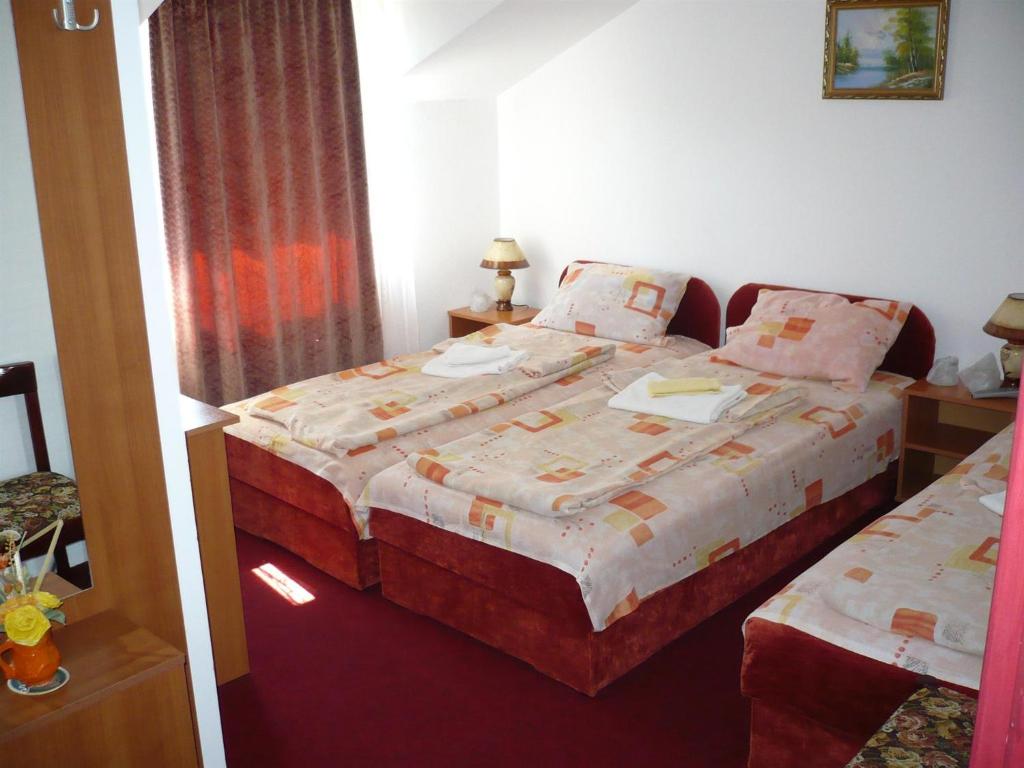 Postel nebo postele na pokoji v ubytování Motel Stara Vrba