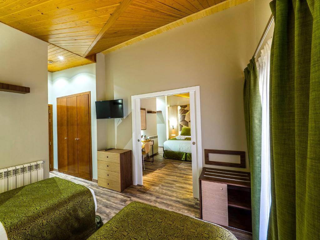 TV a/nebo společenská místnost v ubytování Hotel Princesa Parc
