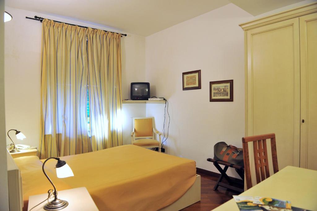TV a/nebo společenská místnost v ubytování Albergo Birra