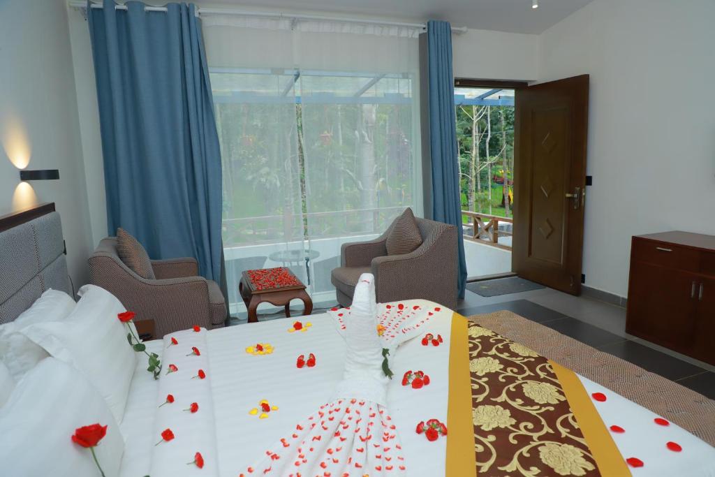 Postel nebo postele na pokoji v ubytování Mainland Resorts & Spa by Kolaahalam