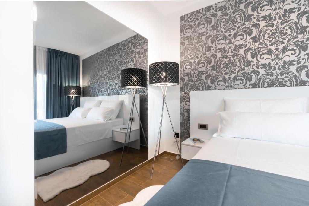 Posteľ alebo postele v izbe v ubytovaní WISH Apartments