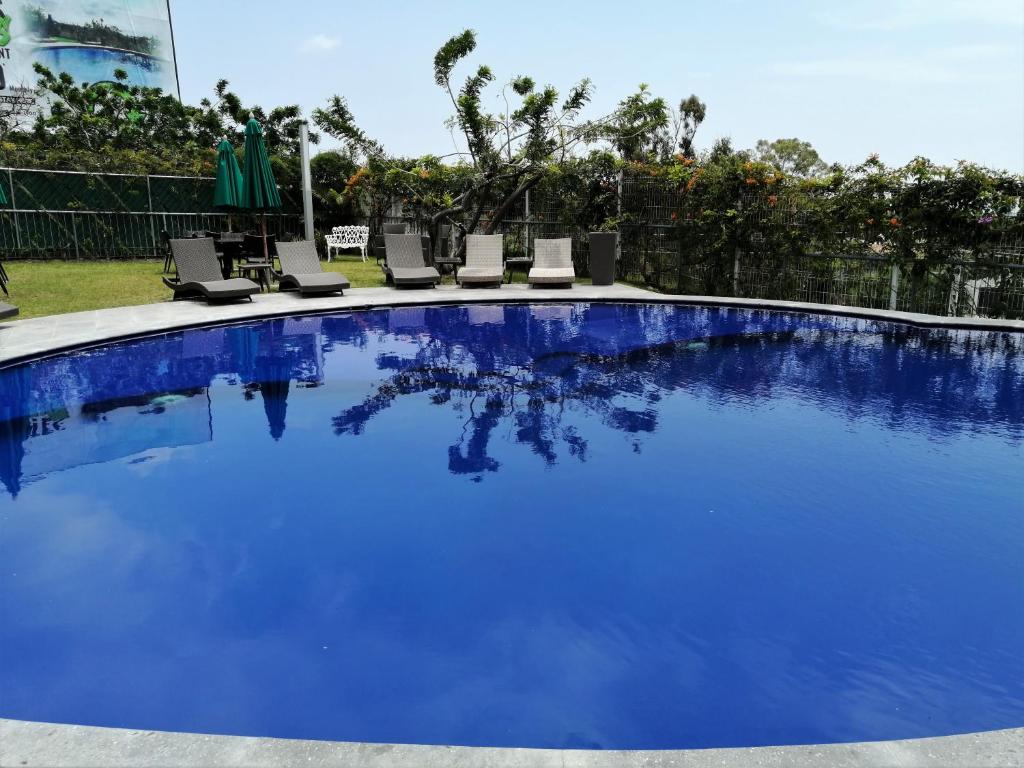 Bazén v ubytování Memora Hotel & Villas Chapala nebo v jeho okolí
