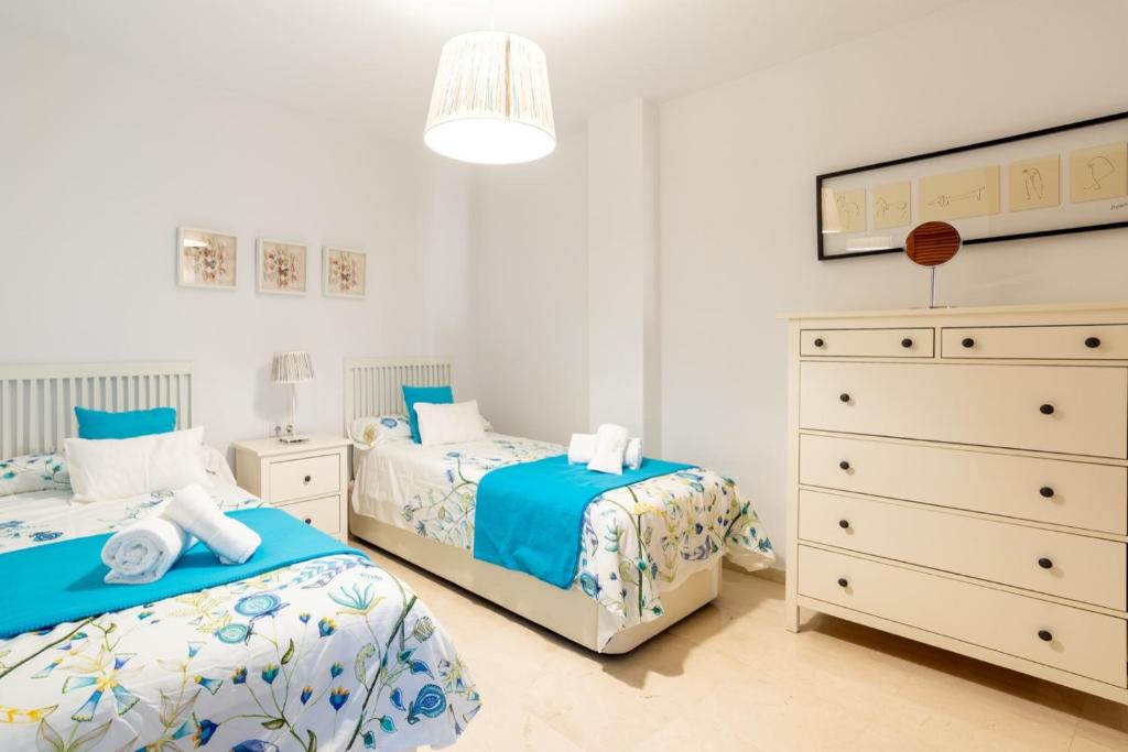 A bed or beds in a room at Victoria 50