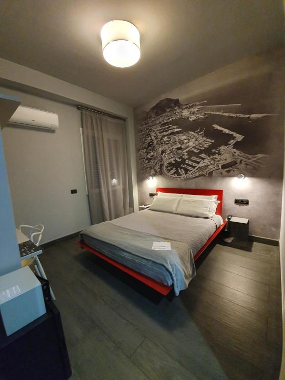Postel nebo postele na pokoji v ubytování Alma Hotel