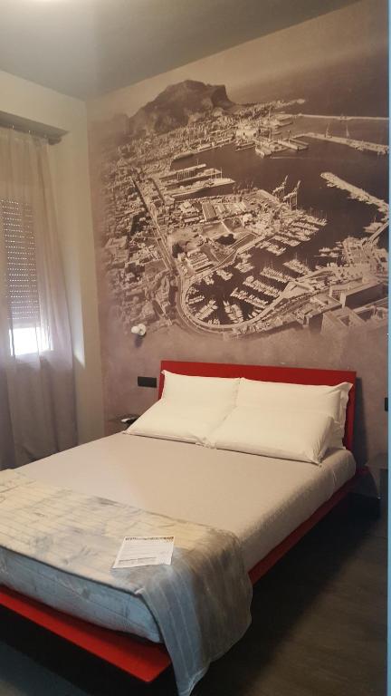 Postel nebo postele na pokoji v ubytování Alma Hotel