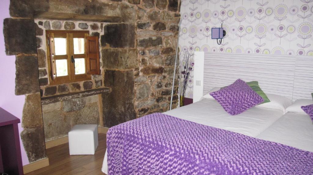 Postel nebo postele na pokoji v ubytování Posada Ormas