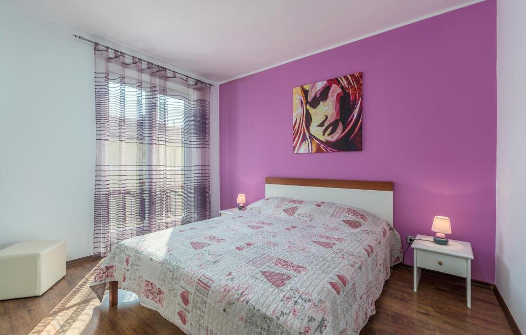 Un pat sau paturi într-o cameră la Apartment Marino