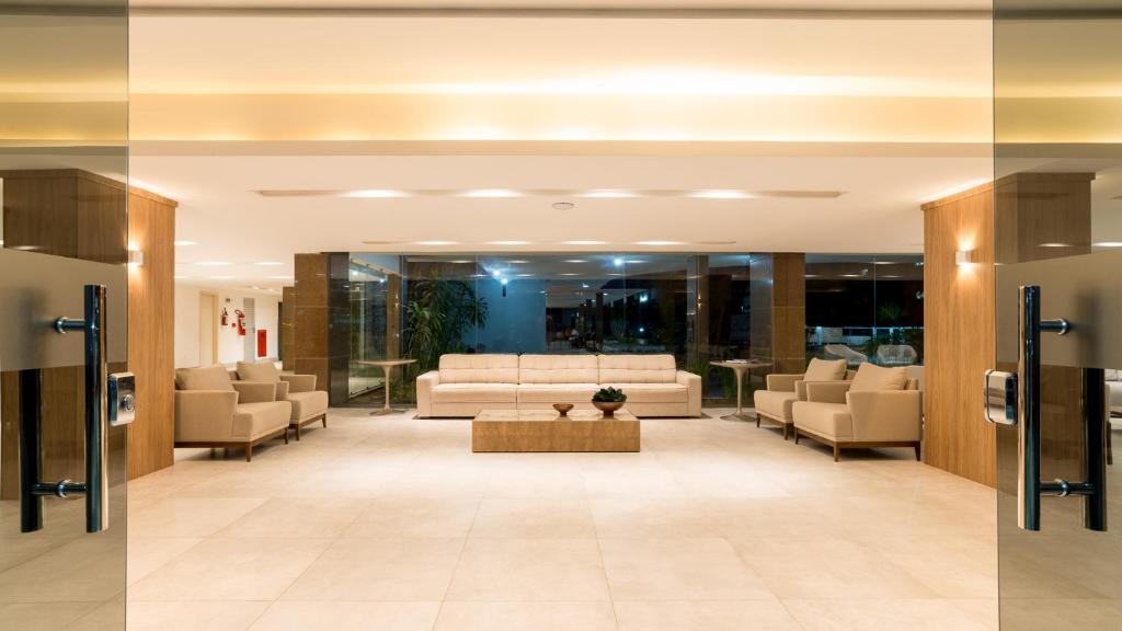 Uma área de estar em El Aram Beach & Convention