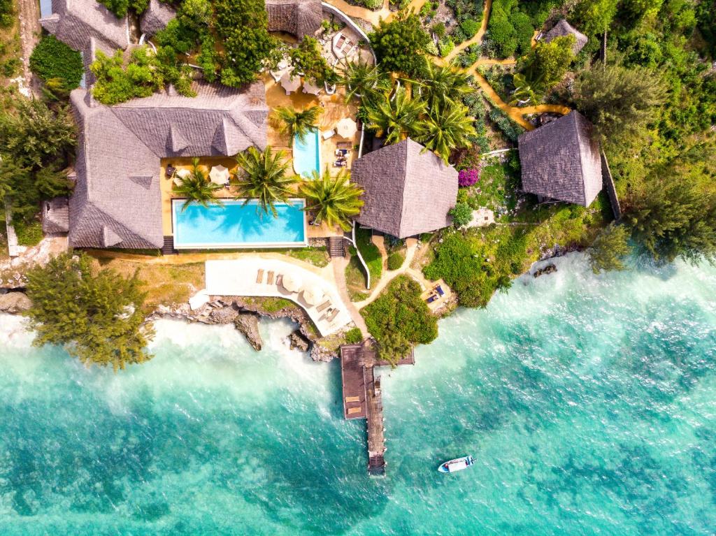 an aerial view of a resort on the water at Sunshine Marine Lodge in Matemwe