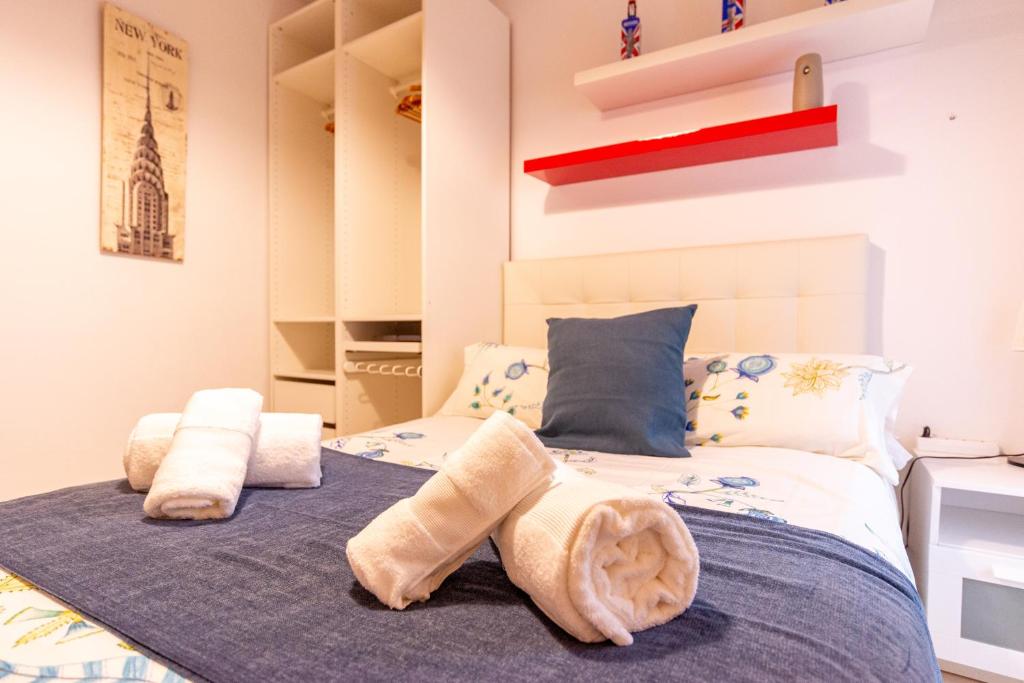 A bed or beds in a room at Victoria 50