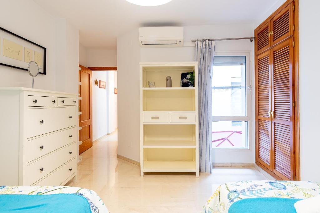 A bed or beds in a room at Victoria 50
