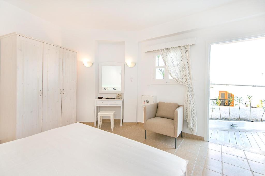 Postel nebo postele na pokoji v ubytování Lindos Harmony Suites