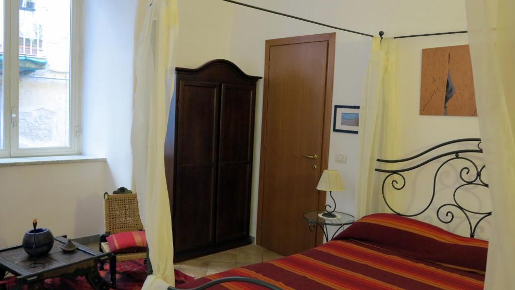 Posteľ alebo postele v izbe v ubytovaní - B&B "Centro Antico" -