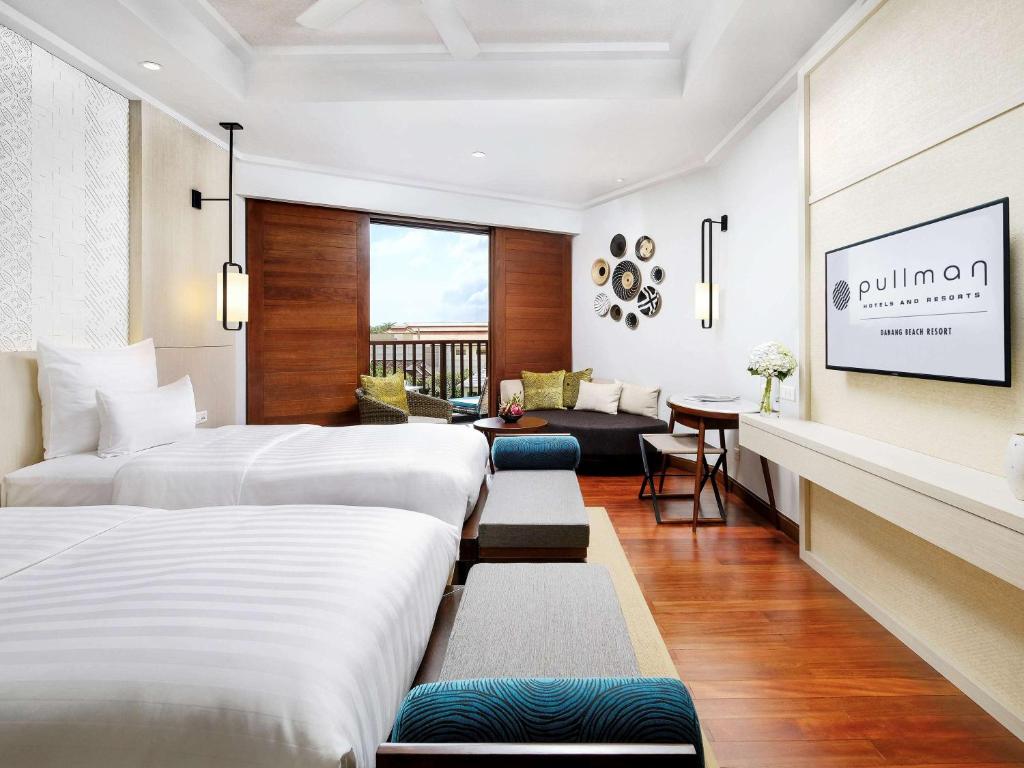 Postel nebo postele na pokoji v ubytování Pullman Danang Beach Resort