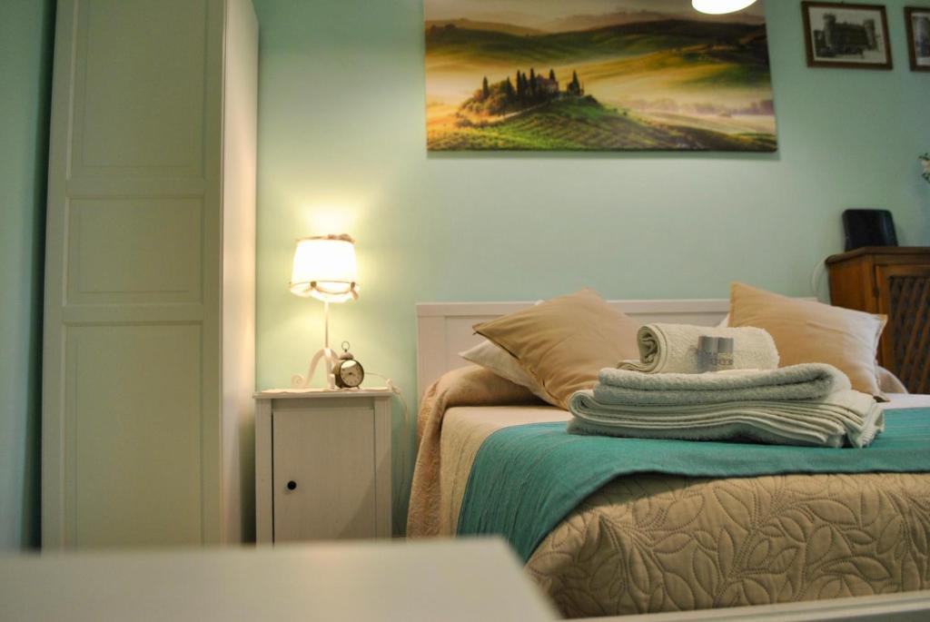 Postel nebo postele na pokoji v ubytování B&B Casa TORET