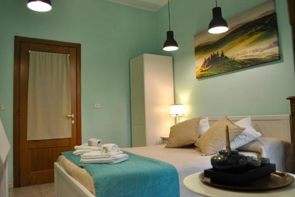 Postel nebo postele na pokoji v ubytování B&B Casa TORET