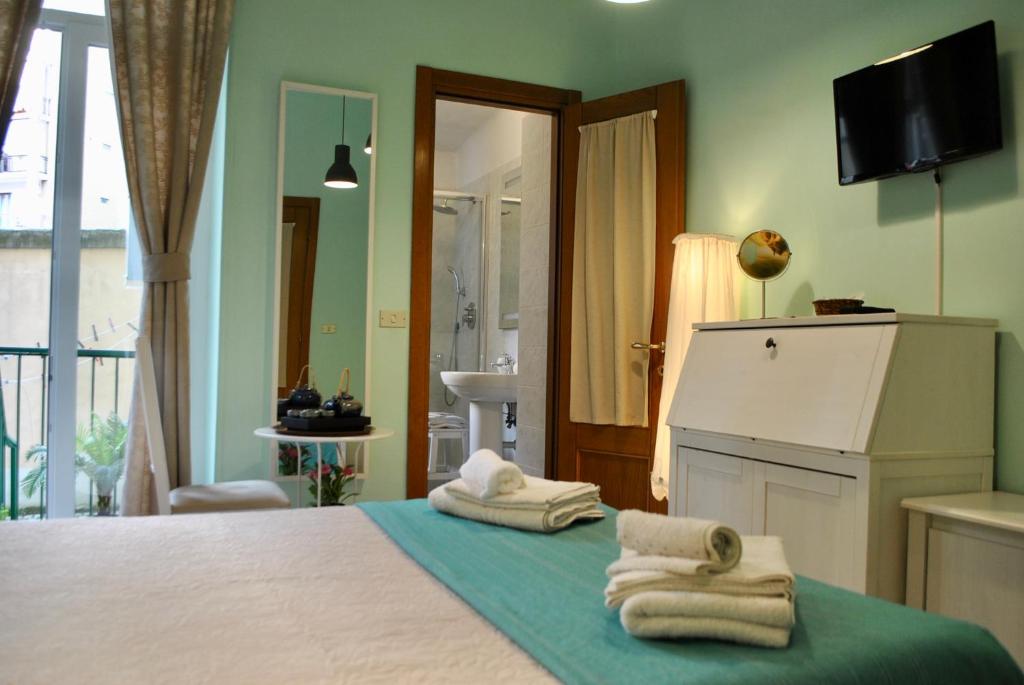 Postel nebo postele na pokoji v ubytování B&B Casa TORET