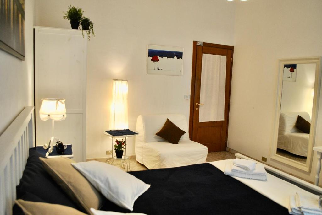 Postel nebo postele na pokoji v ubytování B&B Casa TORET