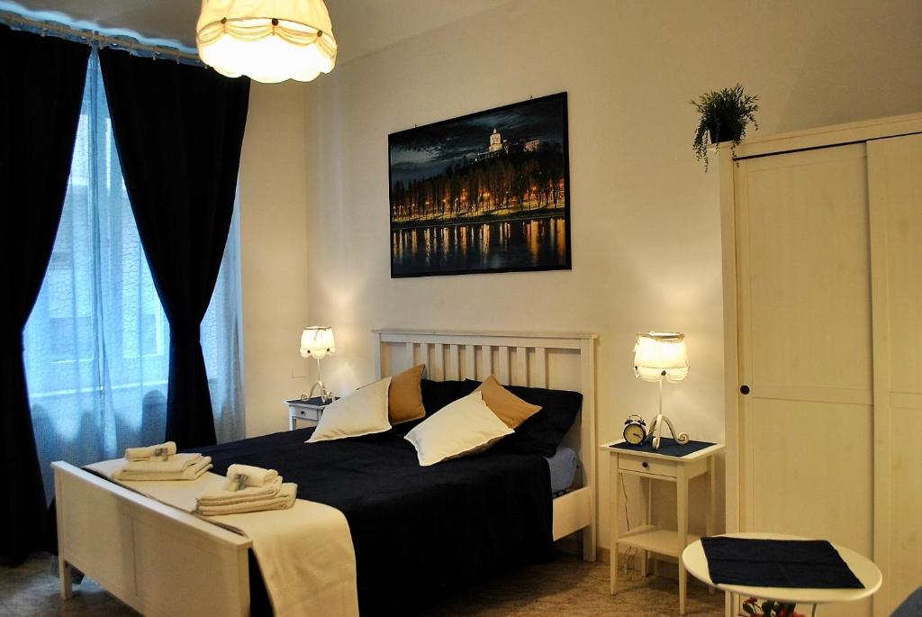 Postel nebo postele na pokoji v ubytování B&B Casa TORET