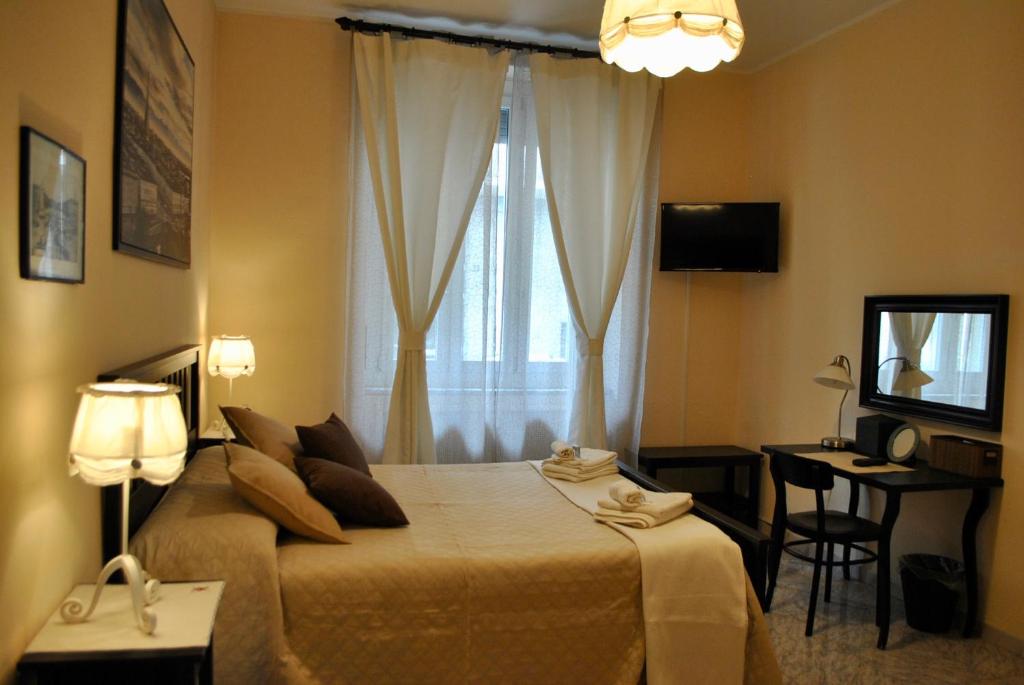 Postel nebo postele na pokoji v ubytování B&B Casa TORET