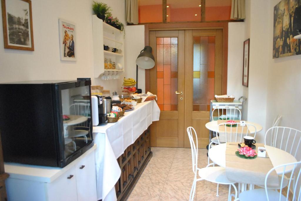 Kuchyň nebo kuchyňský kout v ubytování B&B Casa TORET