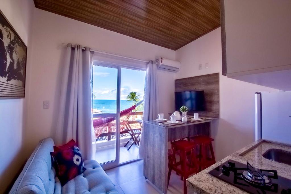Kuchyň nebo kuchyňský kout v ubytování Flats Morro de São Paulo