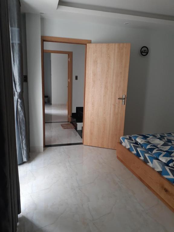 Letto o letti in una camera di Thom's Homestay