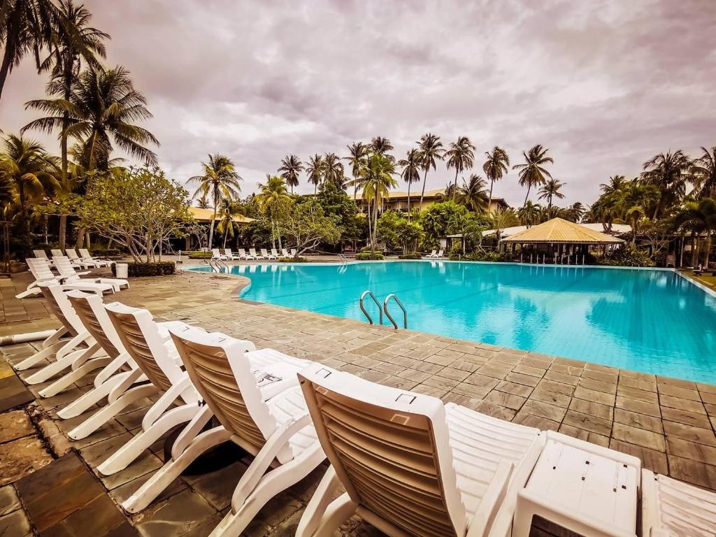 Bazén v ubytování Palm Beach Resort & SPA nebo v jeho okolí