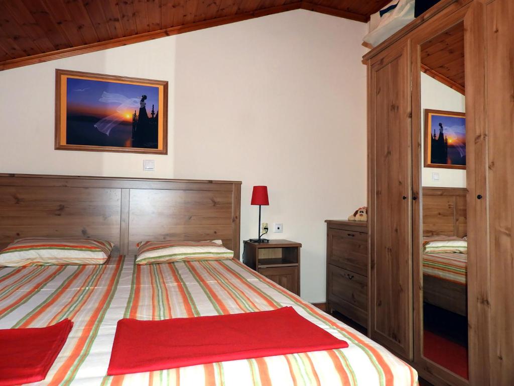 A bed or beds in a room at PanoramaLoft - quality, view, sea & mountain
