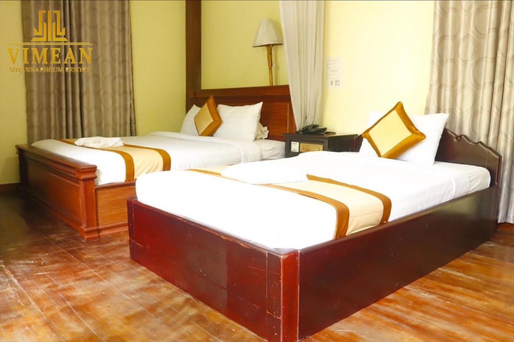 Postel nebo postele na pokoji v ubytování Vimean Sovannaphoum Resort