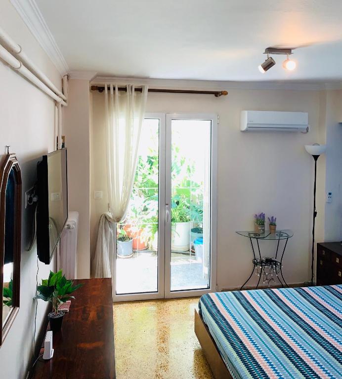 Posteľ alebo postele v izbe v ubytovaní Modern Apartment in The Heart of Athens Near Acropolis