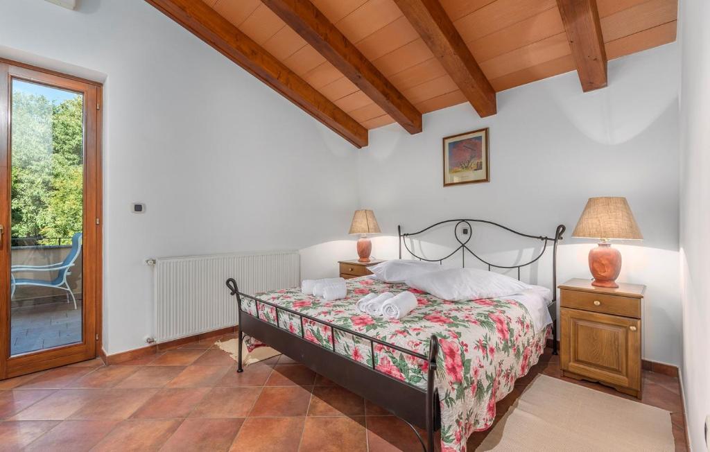 Postel nebo postele na pokoji v ubytování Villa Maggie Vlakovo