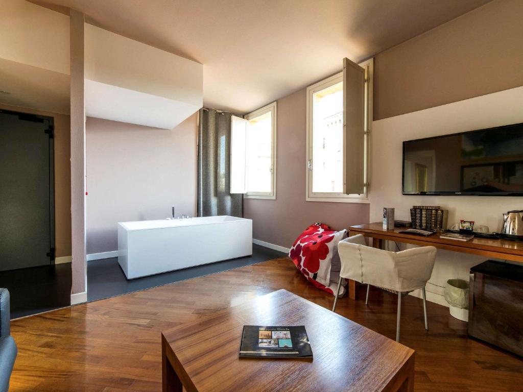 Posezení v ubytování Hotel Ferrara