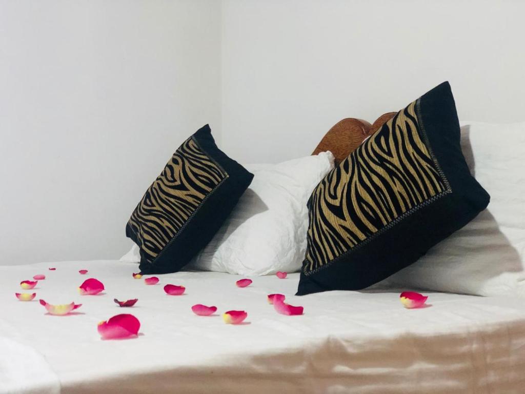 Postel nebo postele na pokoji v ubytování DREAM Hill HOMESTAY NUWARA ELIYA