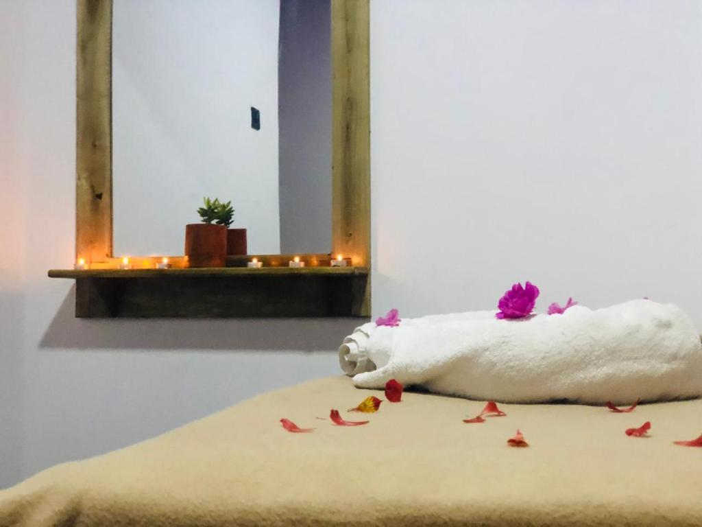 Postel nebo postele na pokoji v ubytování DREAM Hill HOMESTAY NUWARA ELIYA