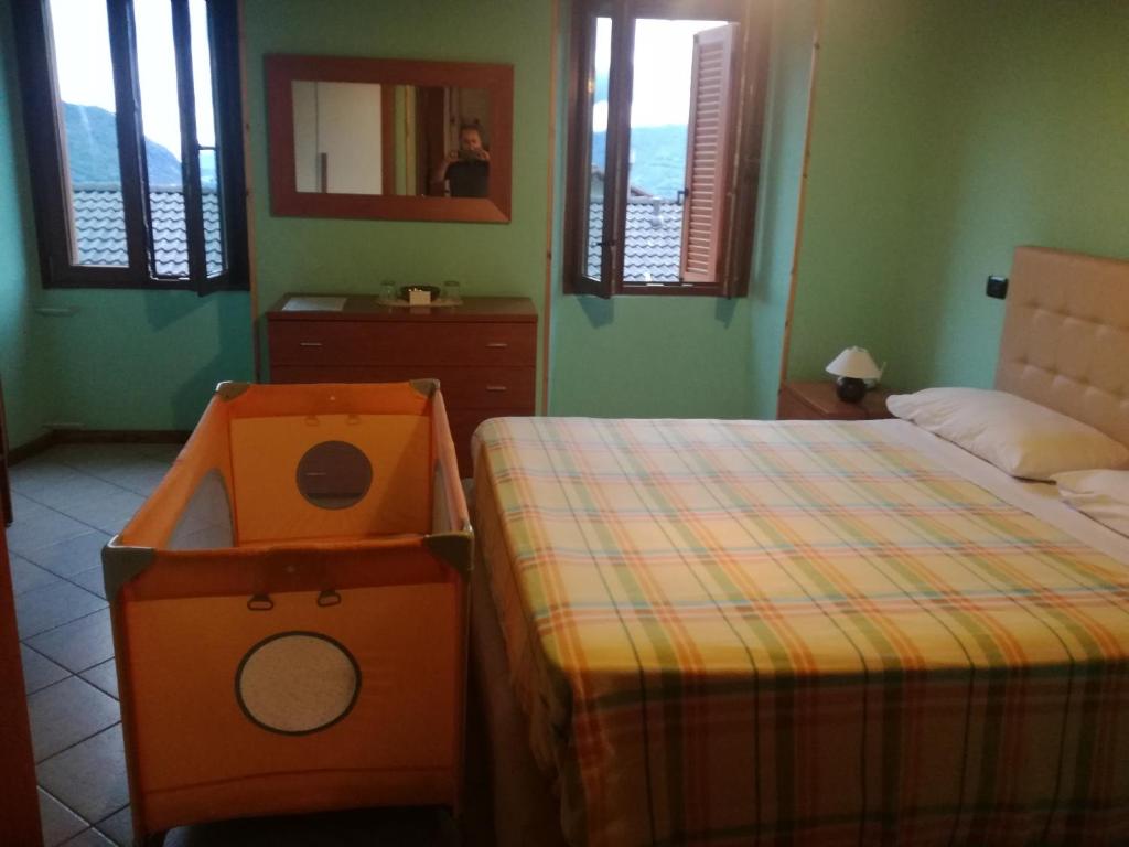 Postel nebo postele na pokoji v ubytování casa tarcisio