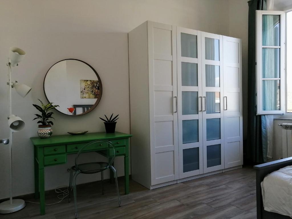 Llit o llits en una habitació de Casa Sansevera Lucca