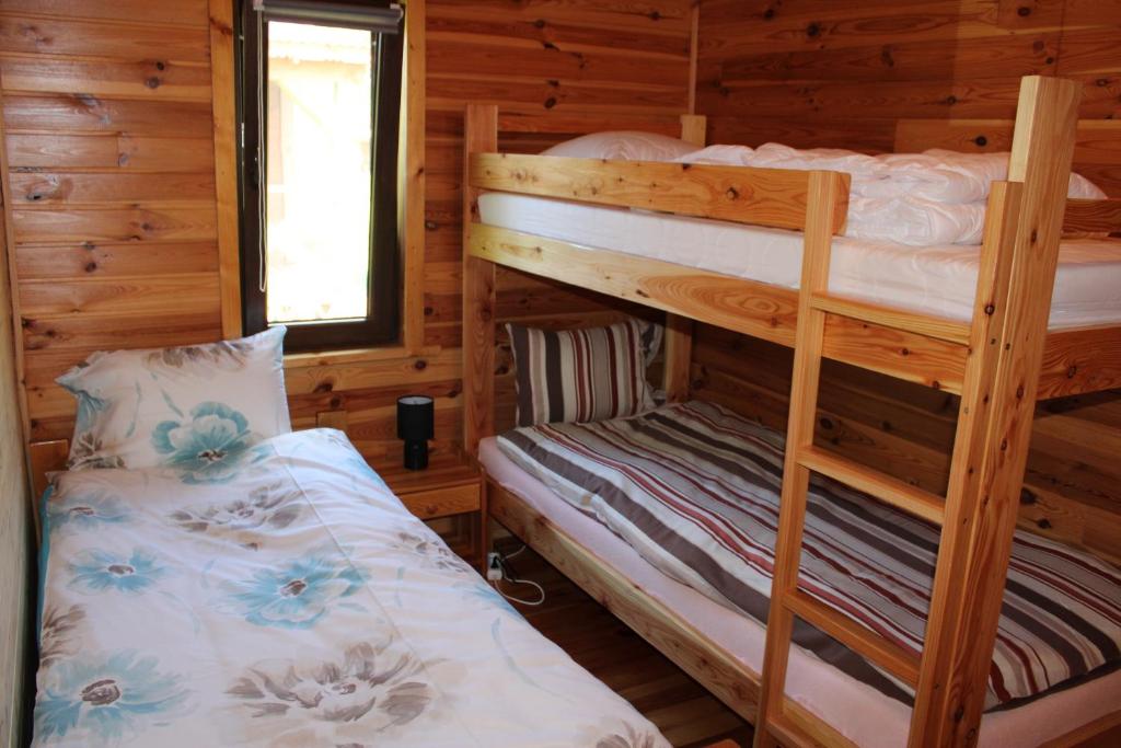 Postel nebo postele na pokoji v ubytování Pod Sokołem