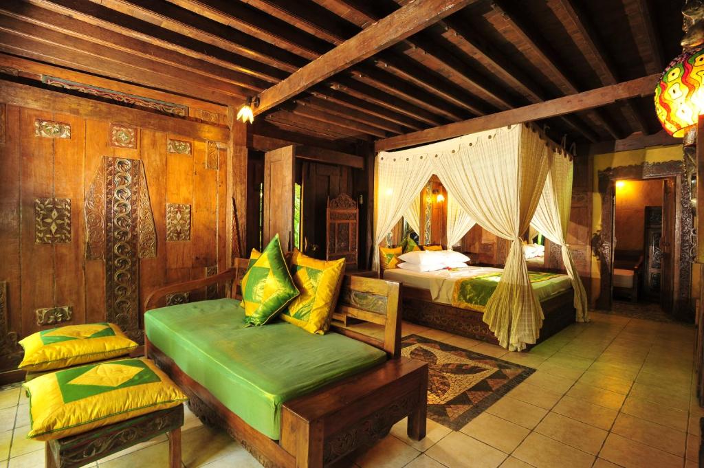 Hotel Pondok Sari Beach & SPA Resort - Deluxe Bungalow Mit Gartenblick