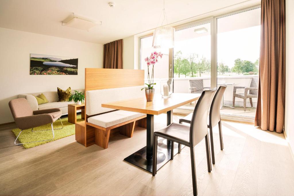 A seating area at Tauernresidence Radstadt by ALPS RESORTS