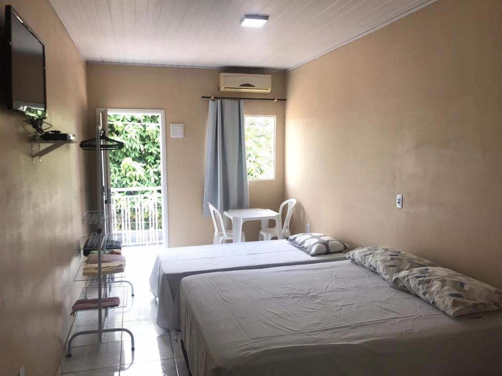 Postel nebo postele na pokoji v ubytování Donaldo Apartamentos