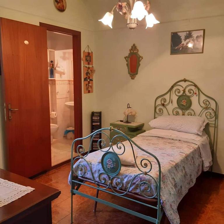 Posteľ alebo postele v izbe v ubytovaní B&B MAMMA ARI