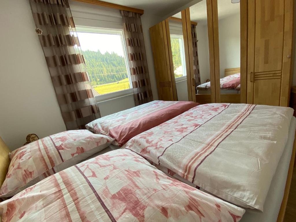 Posteľ alebo postele v izbe v ubytovaní Traumhaus Flattnitz