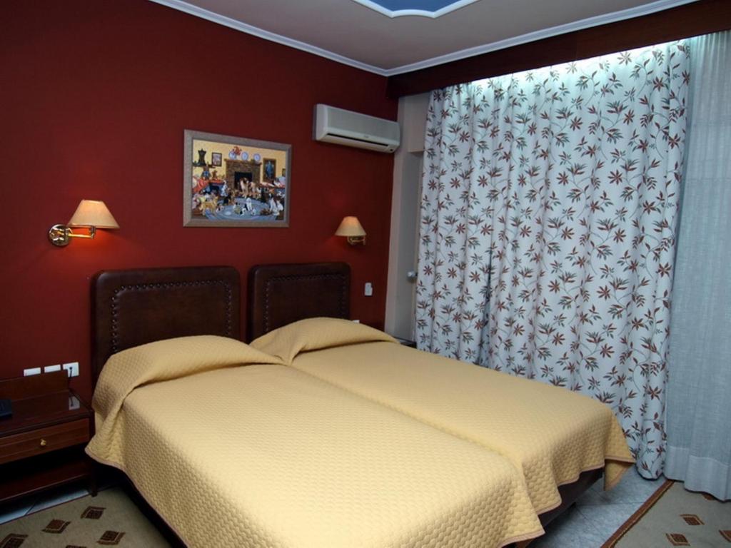Postel nebo postele na pokoji v ubytování Hotel Marianna