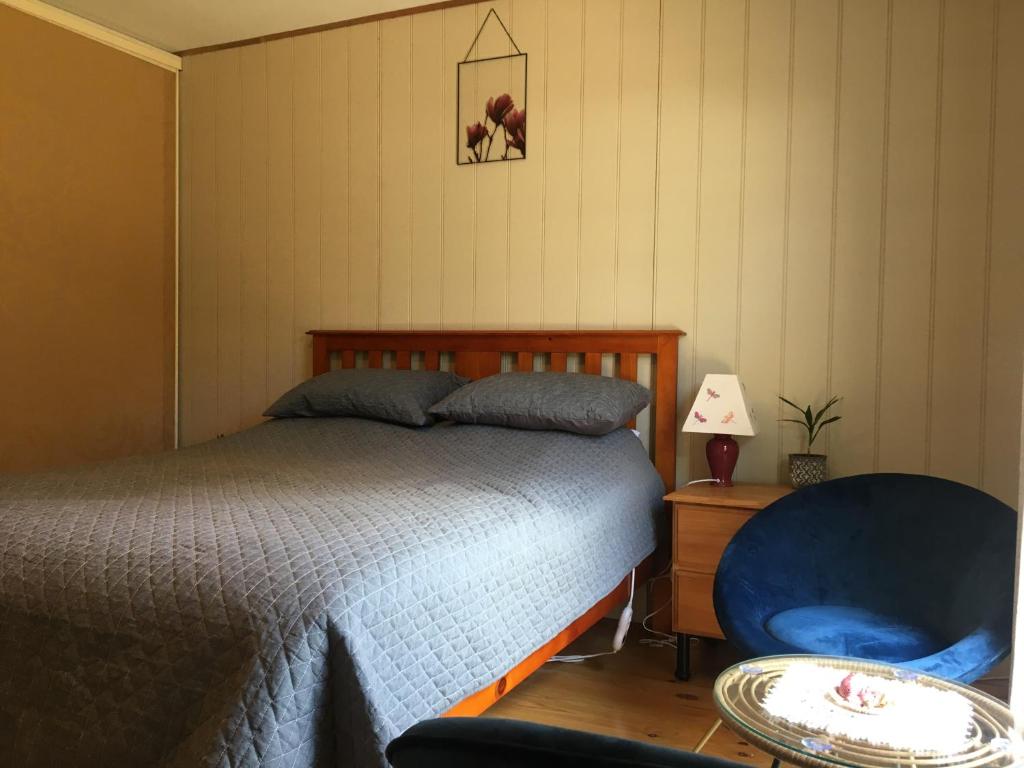 Postel nebo postele na pokoji v ubytování Grampians Nest