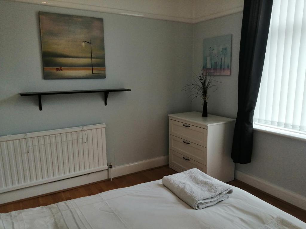 Ein Bett oder Betten in einem Zimmer der Unterkunft Lazy Days