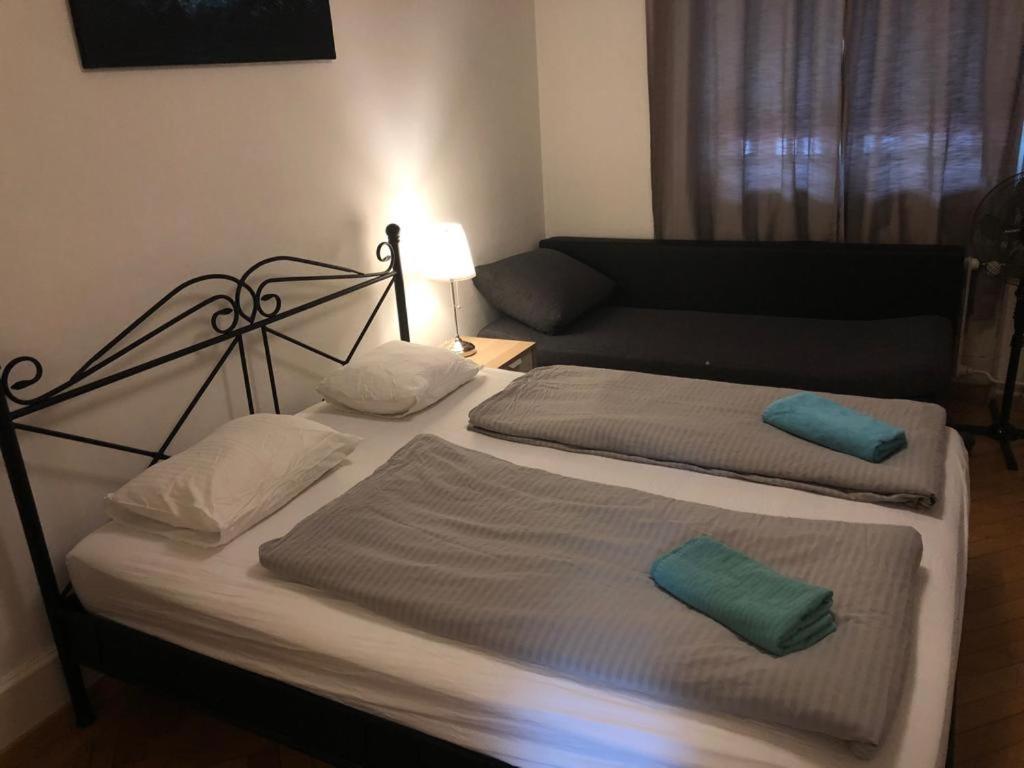 Letto o letti in una camera di ZüriZimmer